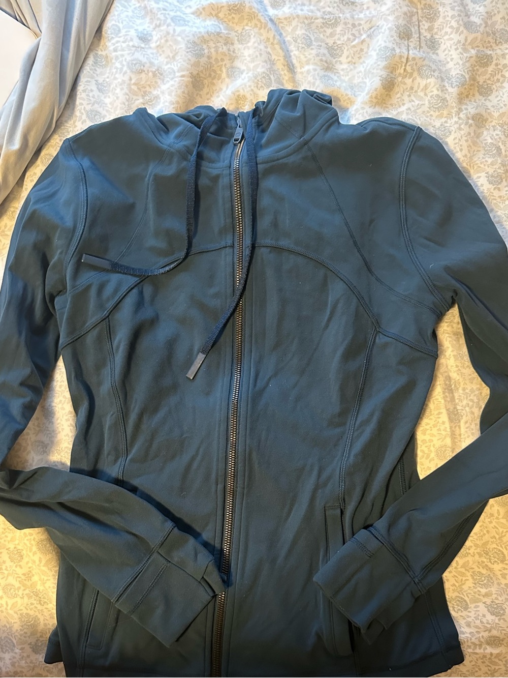Blue lululemon hooded define jacket (slight rip in the arm)